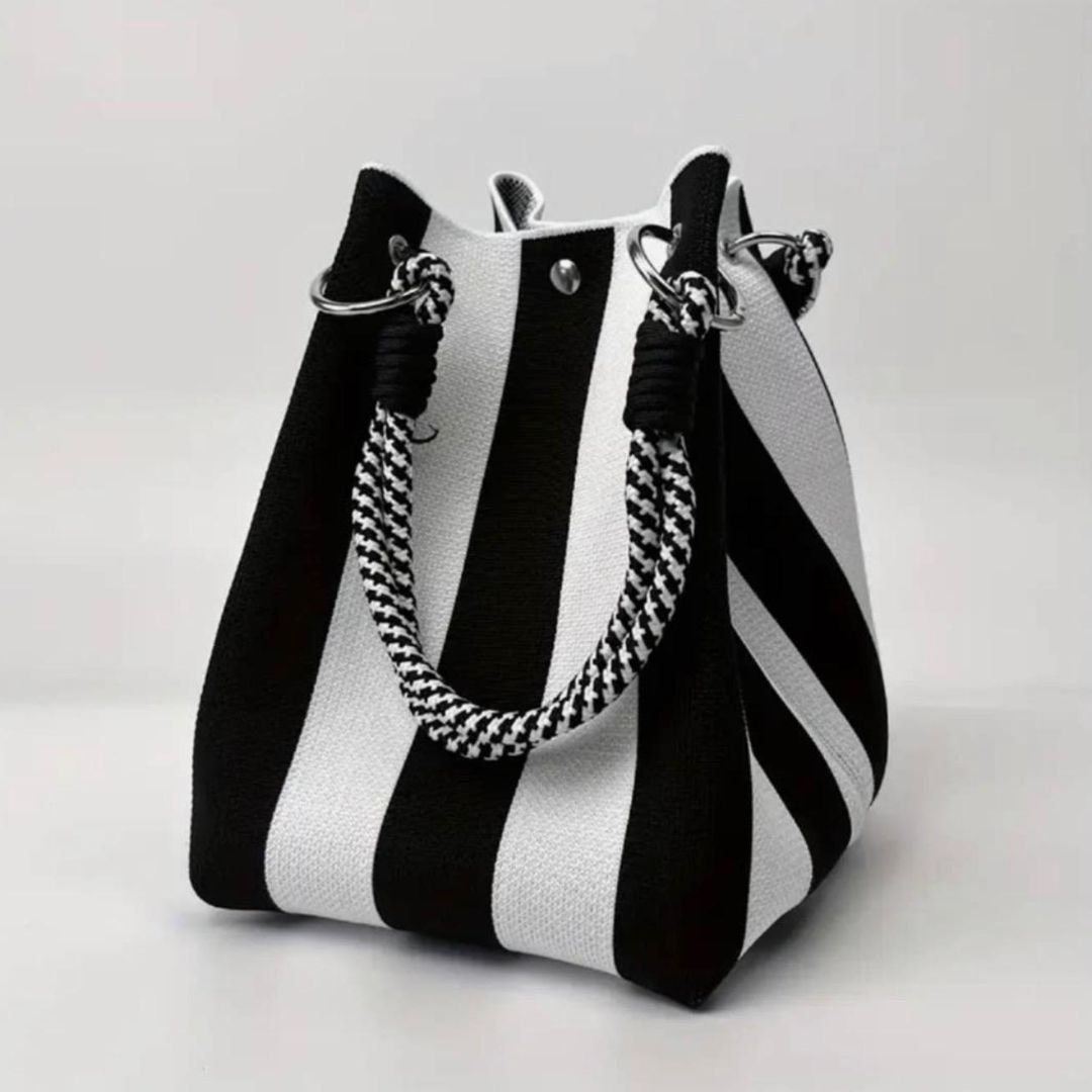 Bolso de mano ,textura tibiada chic