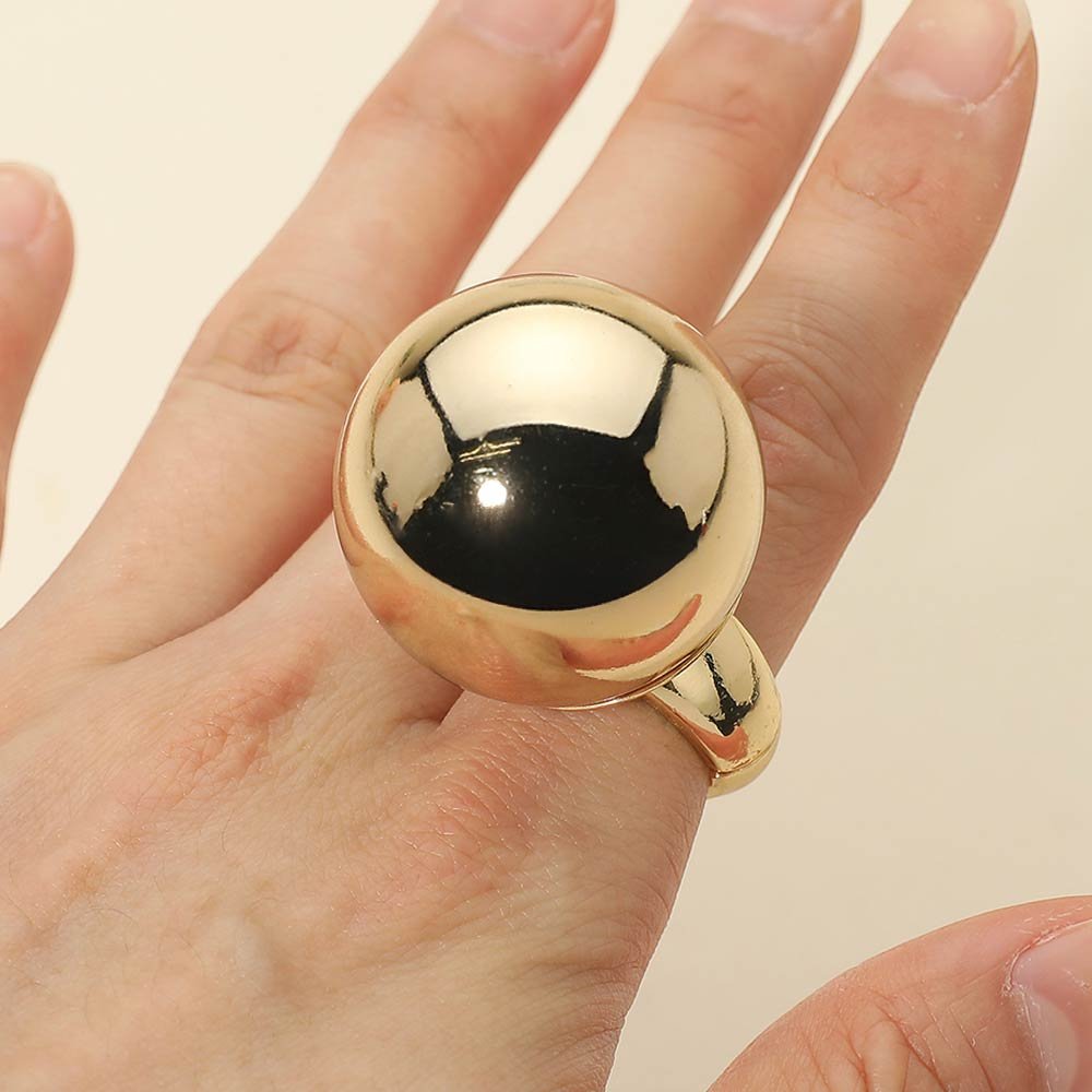Anillo elástico con bola metal pulido