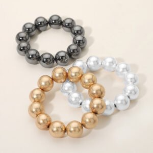 Pulsera elastica con cuentas de metal