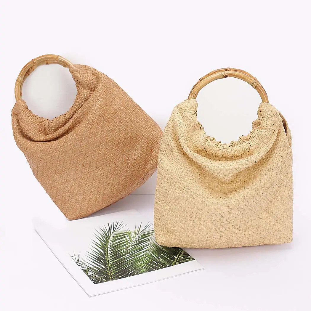 Bolso de mano con asa de bambú